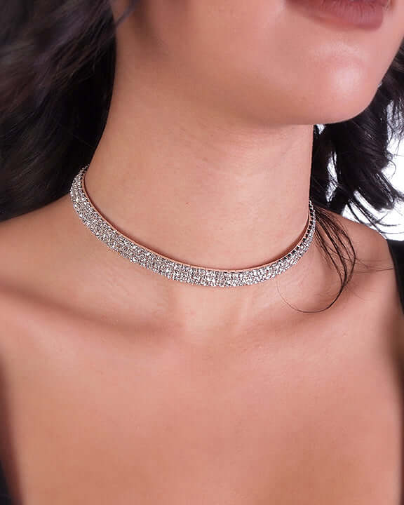 Close-up of a model wearing the Audrey Stretchy Choker, showcasing its elegant design and sparkling details.