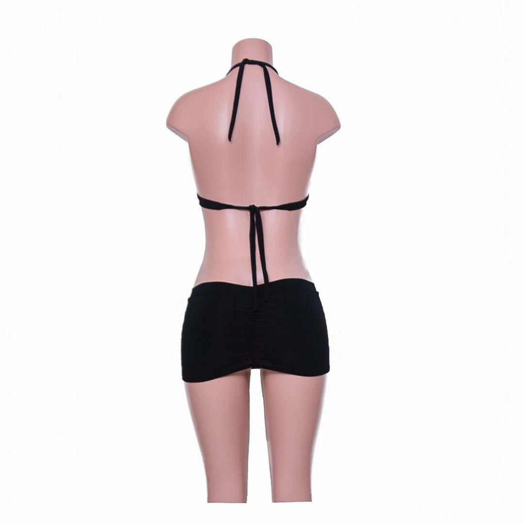 Back view of Amaranthe padded push-up mini dress with halter neck and soft jersey material, featuring a stylish design.